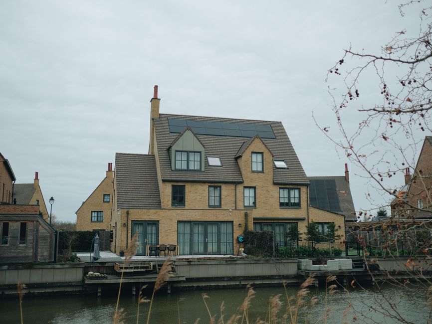 Modern home featuring beautifully integrated residential solar panels on the roof